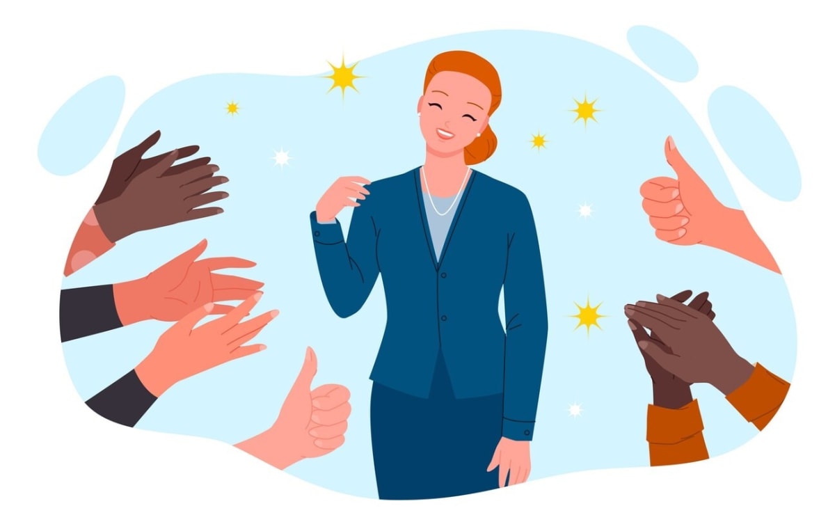 A visual representation of employees being recognized for their achievements in a workplace setting, contributing to boosting employee morale.
