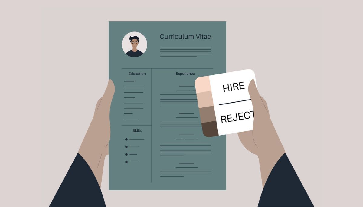 Illustration of hands holding a resume and a card labeled hire or reject, symbolizing unconscious bias in workplace decisions.